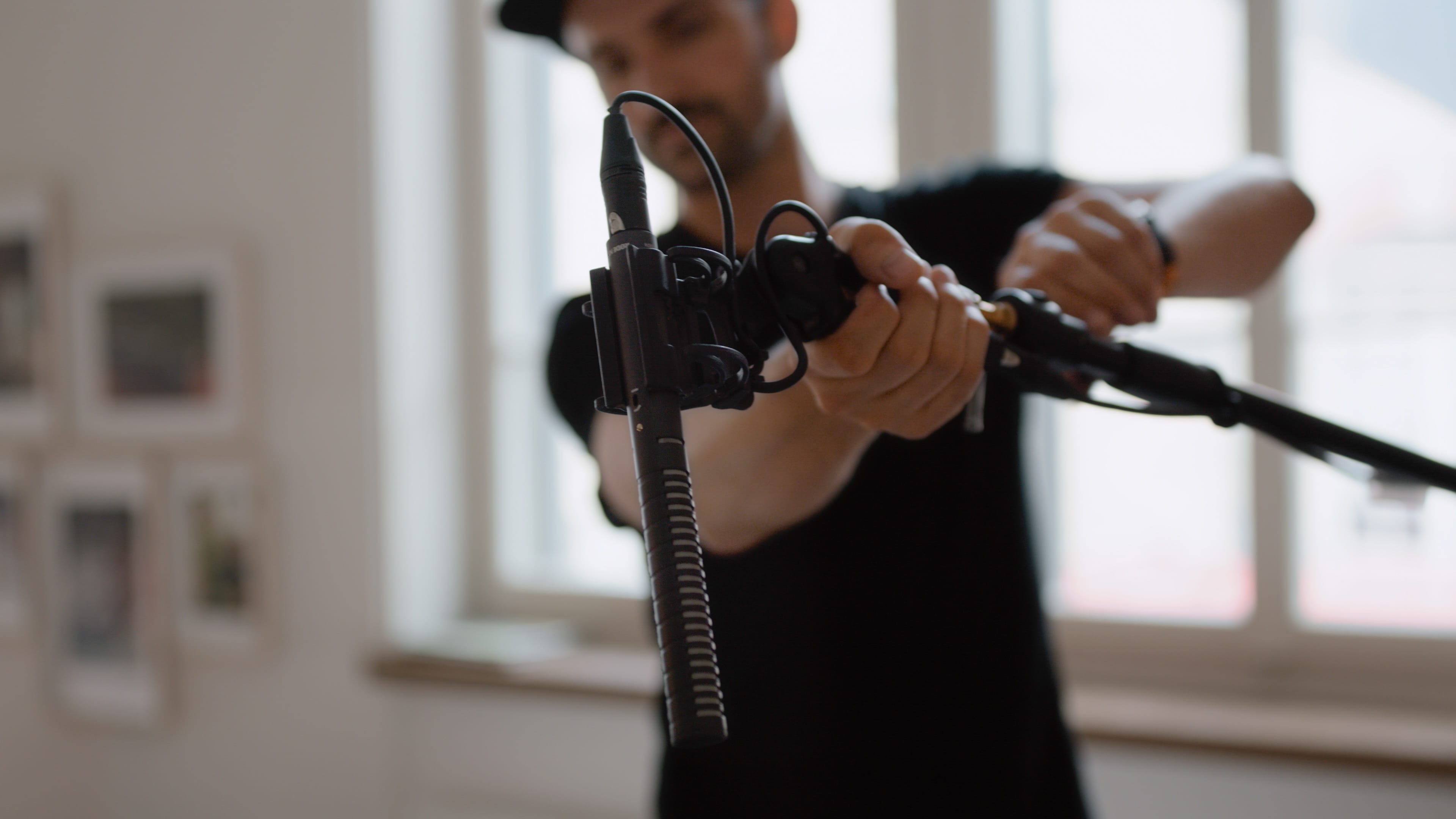 Man setting up microphone